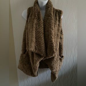 Faux soft Brown Vest with lining. Gently used.